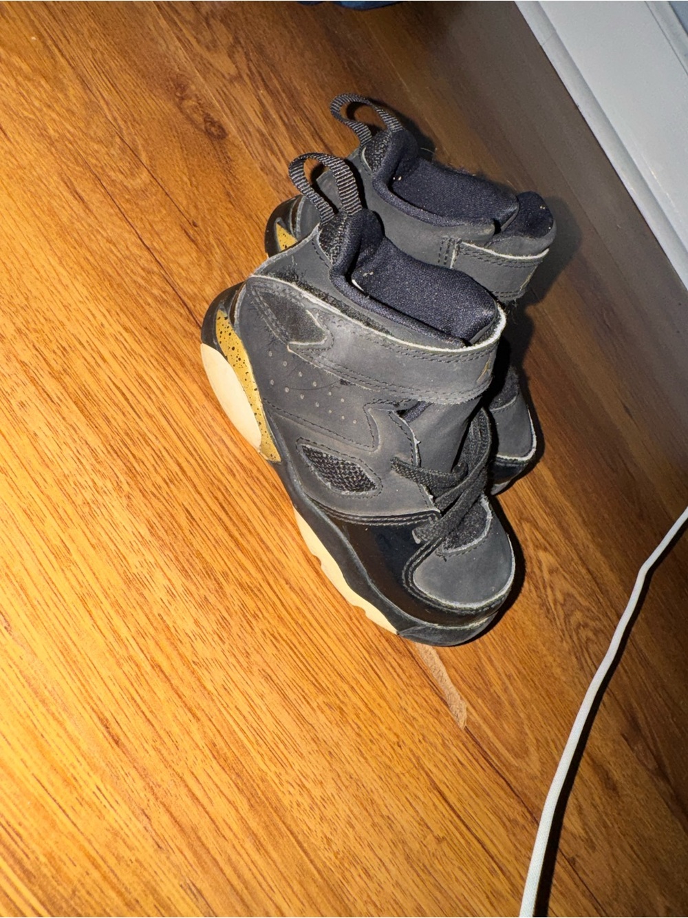 Jordan Kids Black and Gray High-Top Boots with Gold Accents